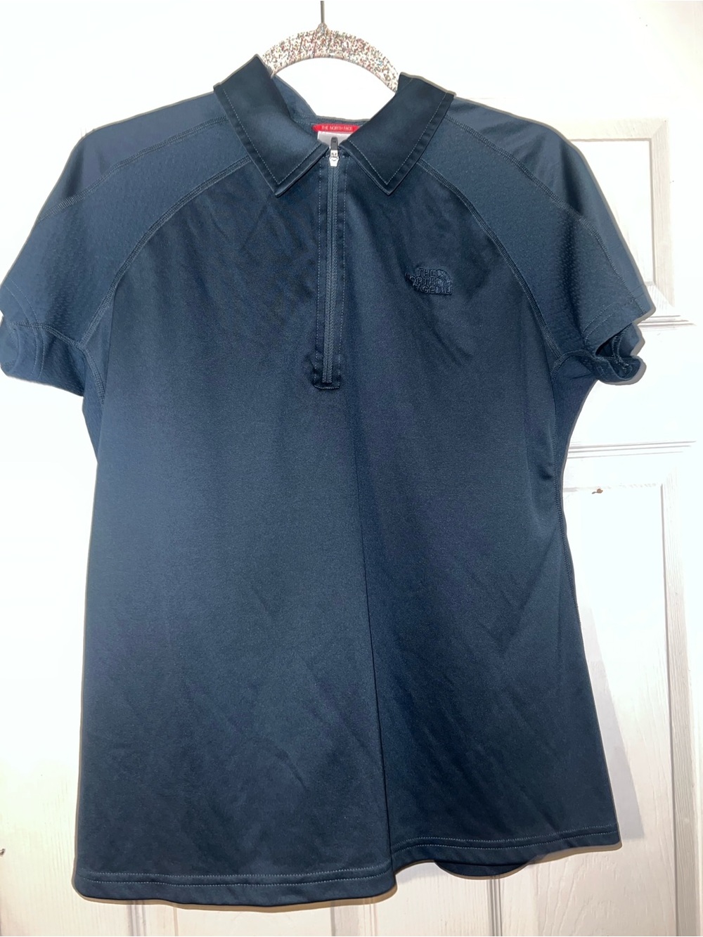 The north face woman’s 1/4 zip blue cycling short sleeve shirt size XL